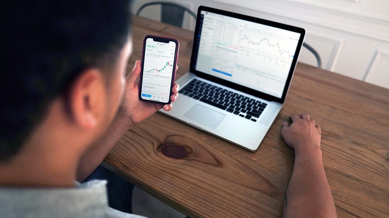 Robinhood logo with AI and stock market elements illustrating riding ai rally robinhood