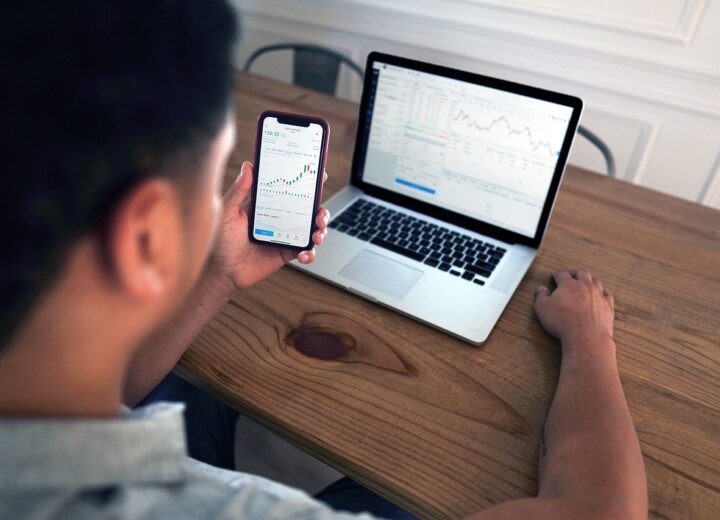 Robinhood logo with AI and stock market elements illustrating riding ai rally robinhood