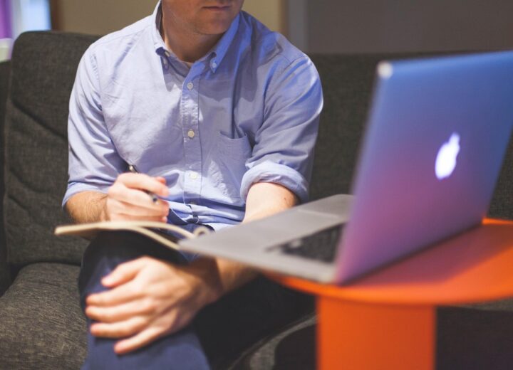 Stack of professional business proposal templates on a desk