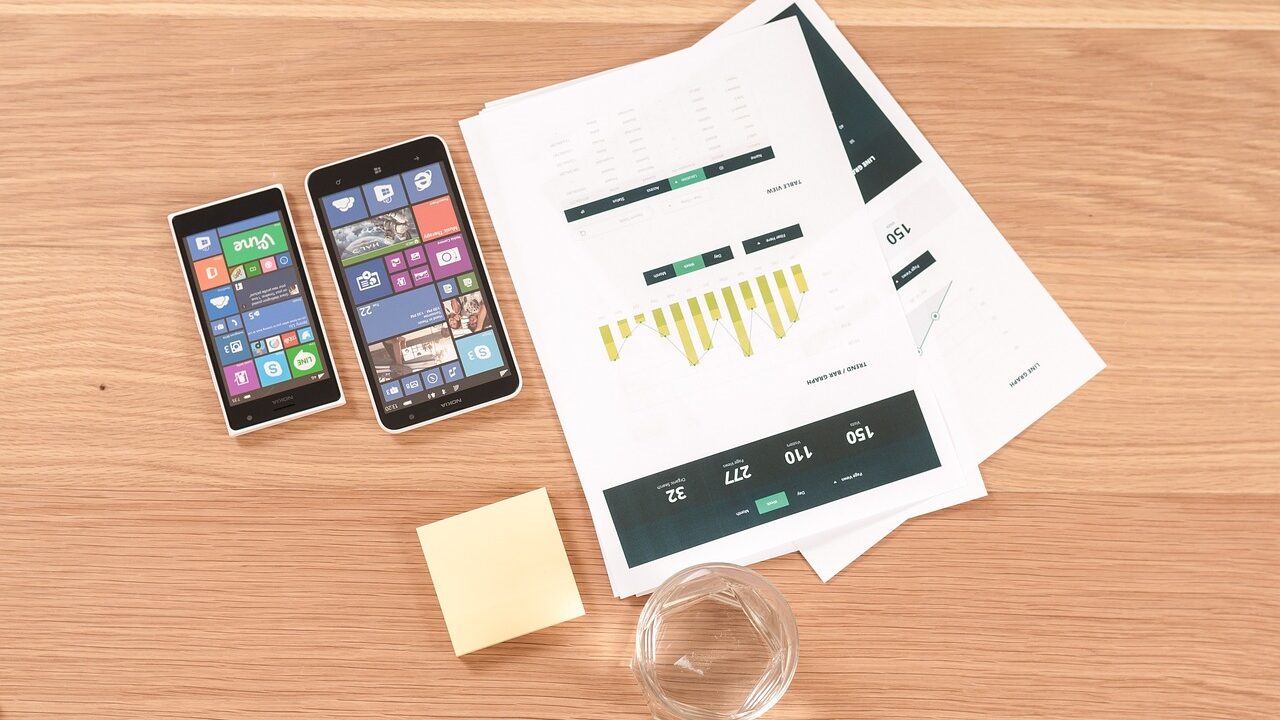 A team collaborating using various productivity apps on devices