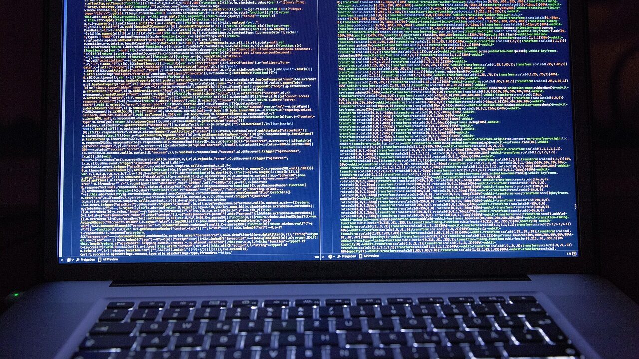 A sleek computer screen displaying vibrant modern web design elements