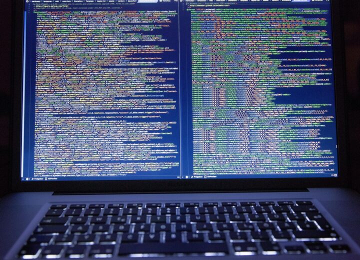 A sleek computer screen displaying vibrant modern web design elements