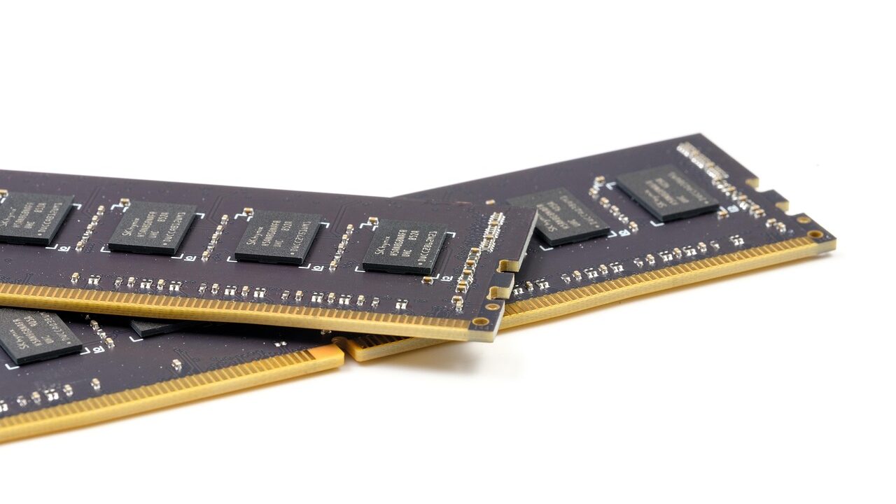 Close-up of Apple devices with memory chips and supply chain elements