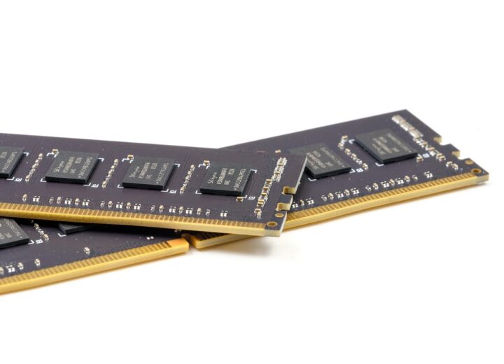 Close-up of Apple devices with memory chips and supply chain elements