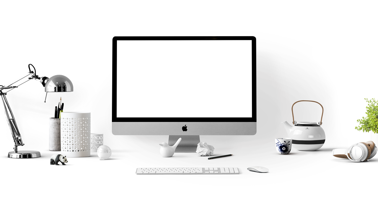 Various Apple devices including MacBook, iPad, and AirPods on sale